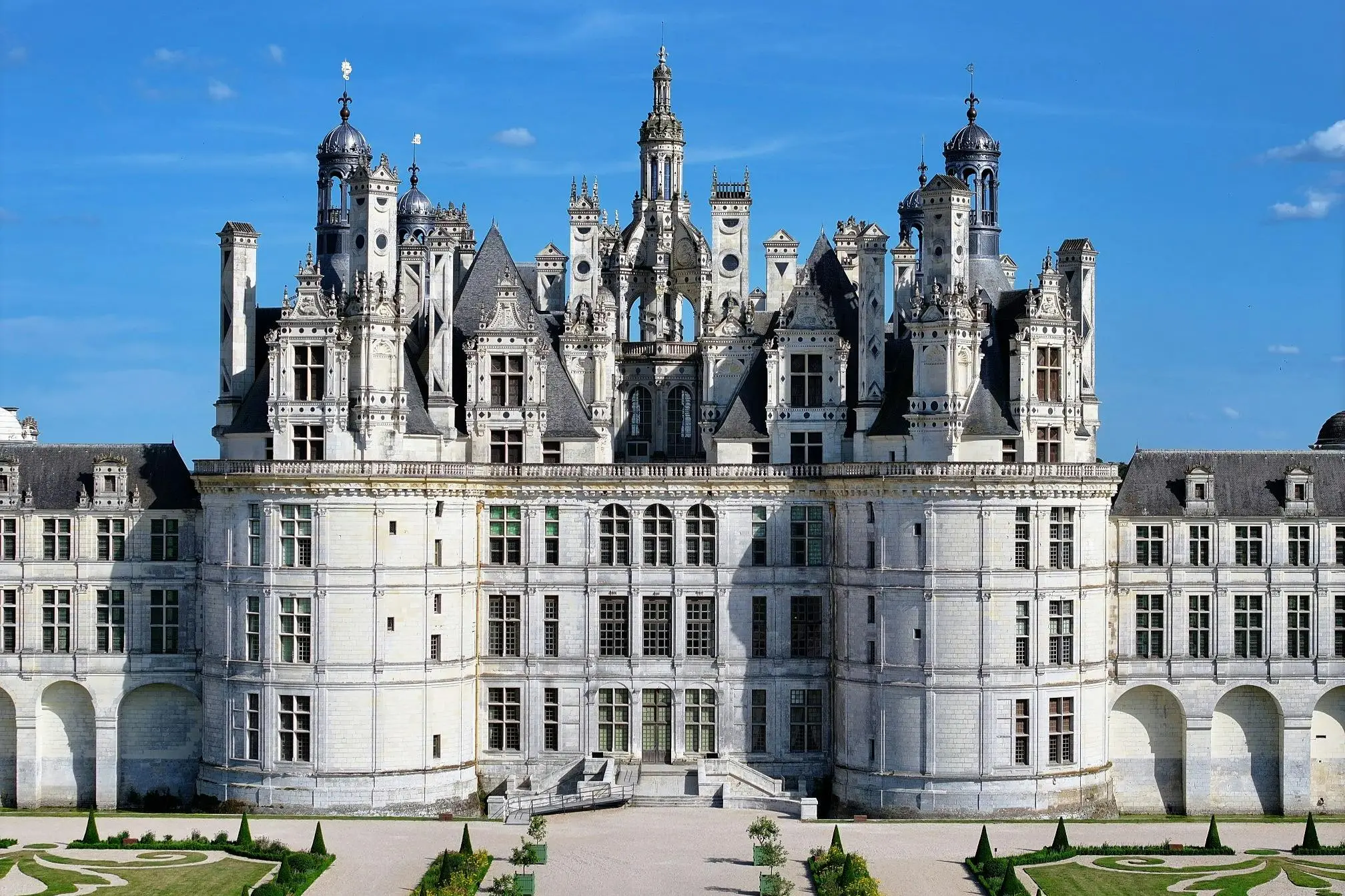 Chateau de Chambord, a grand French Renaissance castle, with ornate towers and gardens.